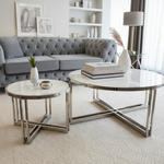 Coffee table set with white marble tops in modern setting