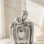 Couples statue close-up in light setting