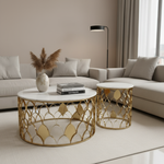 Gold and marble coffee tables in modern setting
