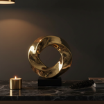 Gold Ring Sculpture in Luxury Setting