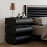 Modern black pedestal in contemporary setting