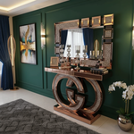 Rose gold console and mirror in luxurious setting