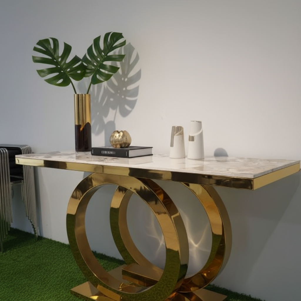 Shiny gold console table with beige marble top in contemporary interior