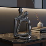 Silver sweethearts sculpture close-up in luxury setting