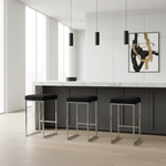 Three bar stools at contemporary kitchen island