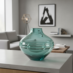 Turquoise glass vase in modern setting