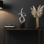 Twirl Silver Sculpture in Luxury Setting